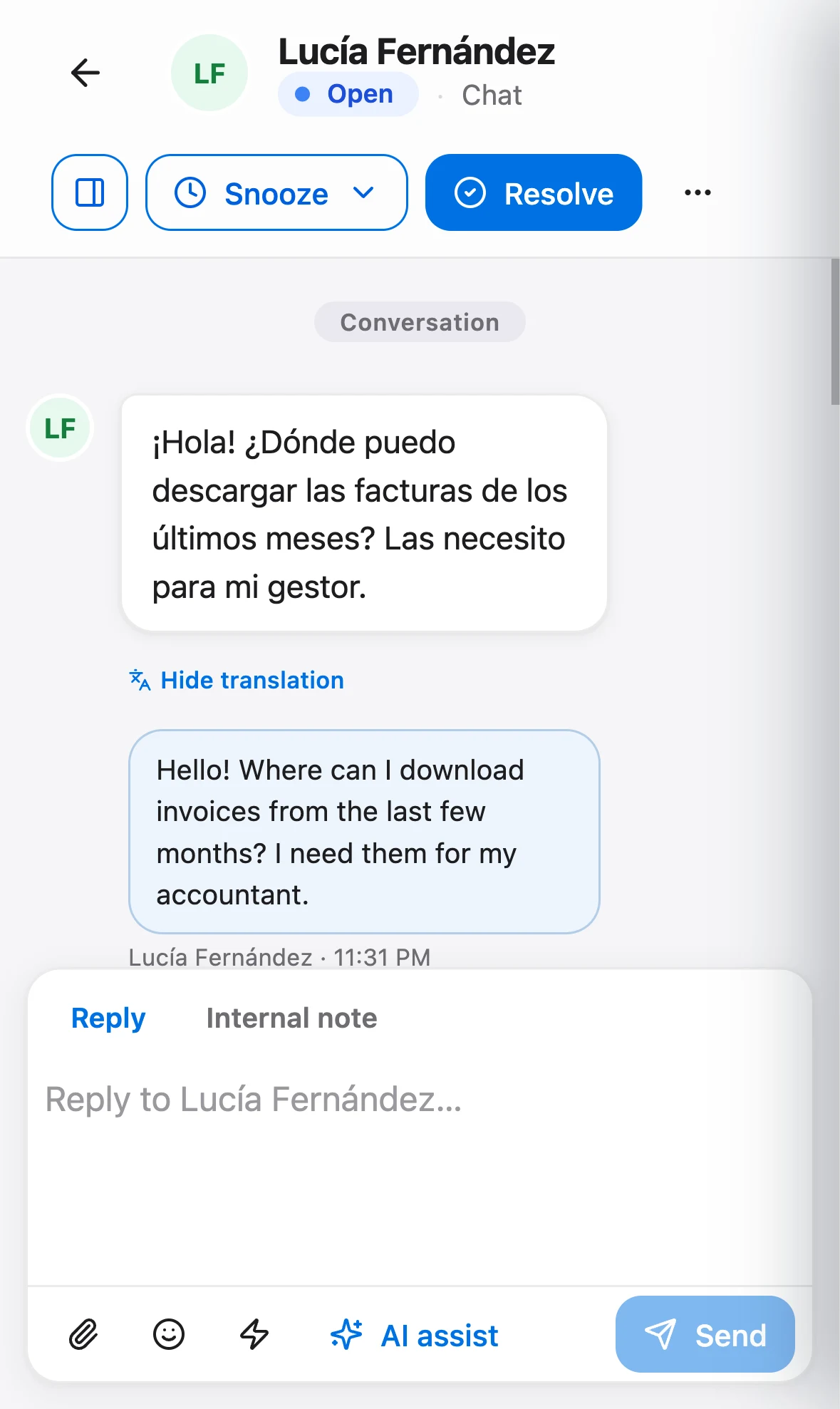 Talvo on a phone: a Spanish message with its English translation underneath.